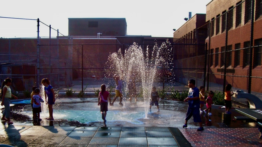 kids playing in splash pad